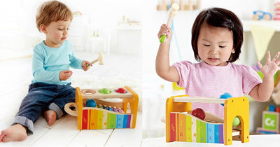 toddlers playing with Baby Toys sold at Wee Bee Baby Boutique