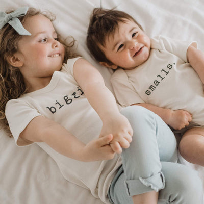 kids wearing gender neutral clothes purchased from Wee Bee Baby Boutique Atlanta